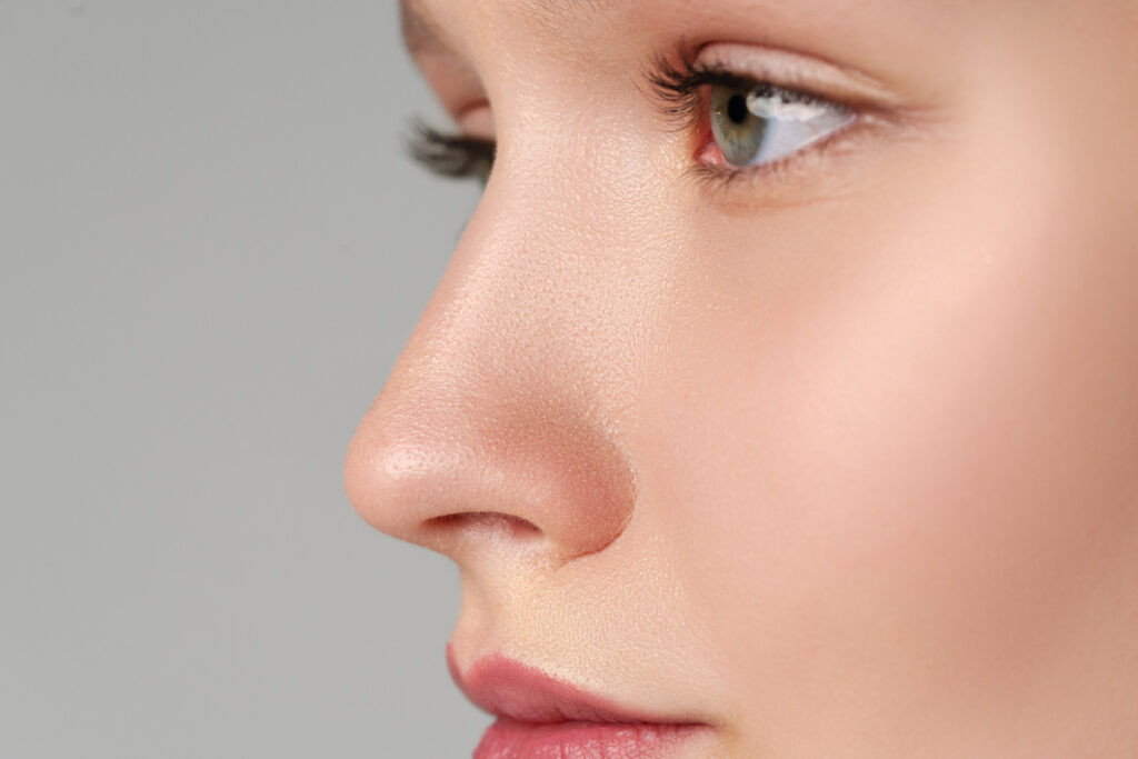 This close up features a woman's profile after her nose reduction in Oklahoma City.